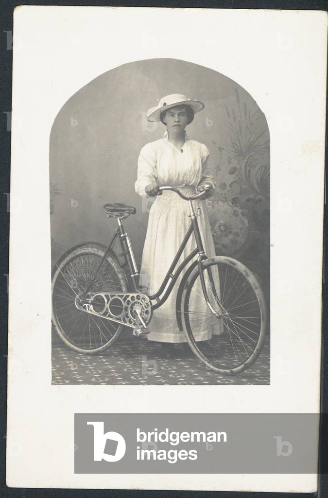 Woman with a bicycle (b/w photo)