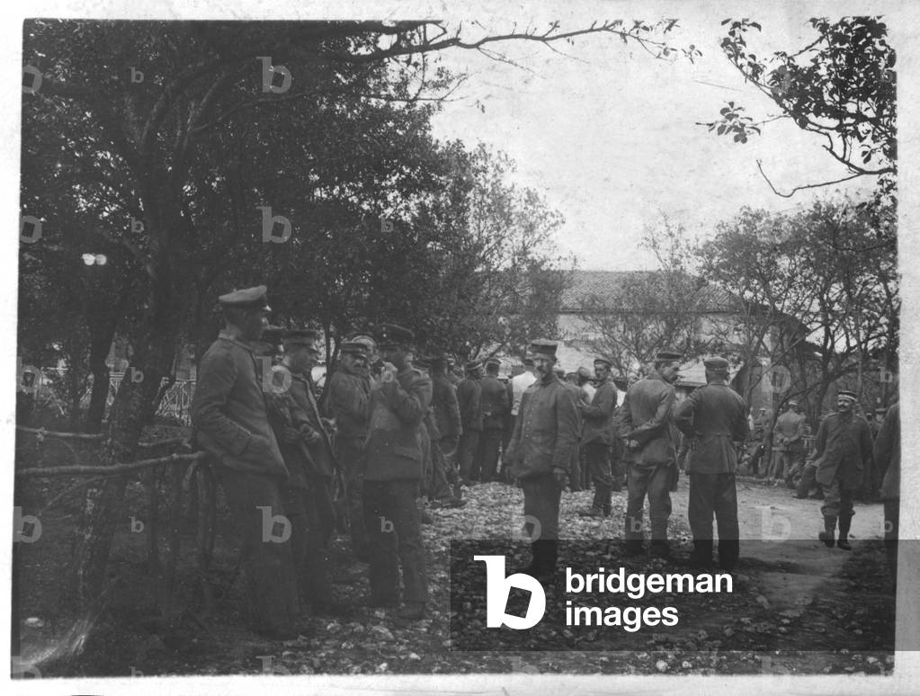 German soldiers in a village or town square (b/w photo)