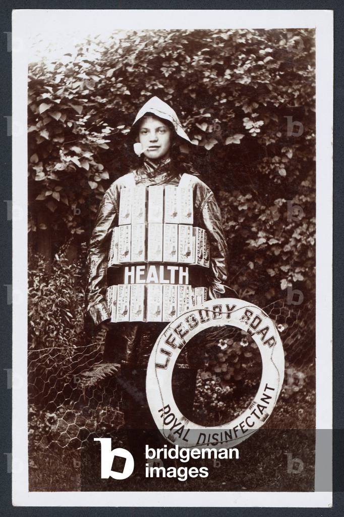 Boy advertising Lifebuoy Soap (b/w photo)
