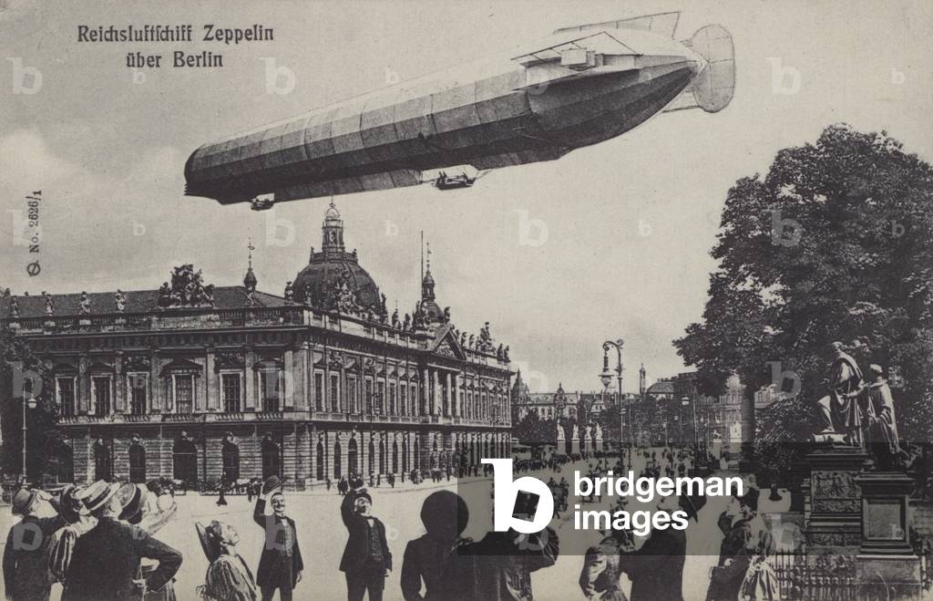 Zeppelin airship flying over Berlin (b/w photo)