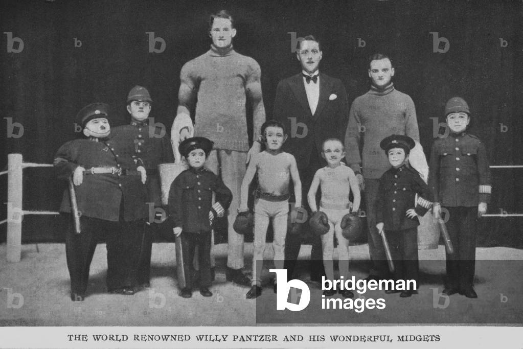 A portrait of Willy Pantzer and his wonderful midgets. (b/w photo)