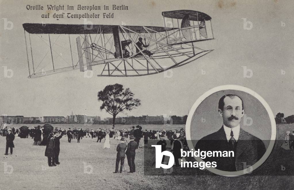 Orville Wright flying his aeroplane over Temelhof airfield, Berlin (b/w photo)