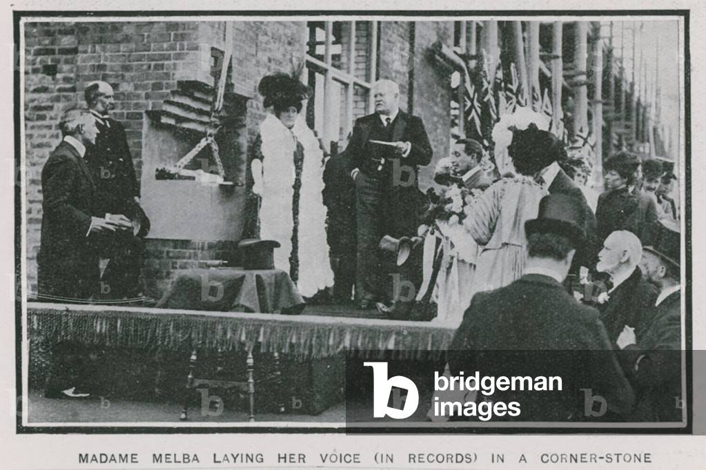 Madame Melba laying her voice on record in a corner-stone (photo)