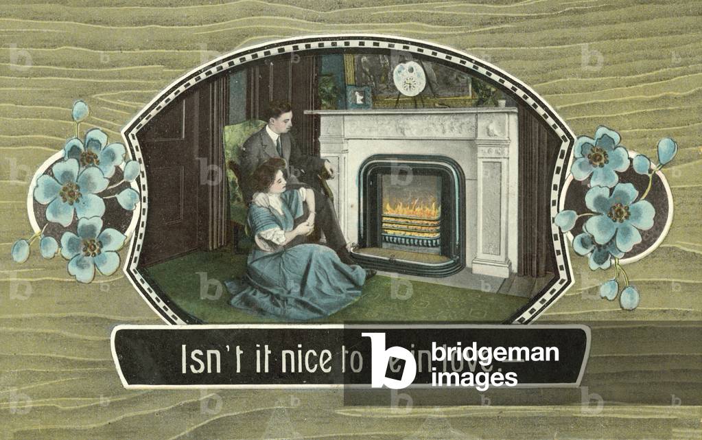 Couple sitting by a fire (colour photo)