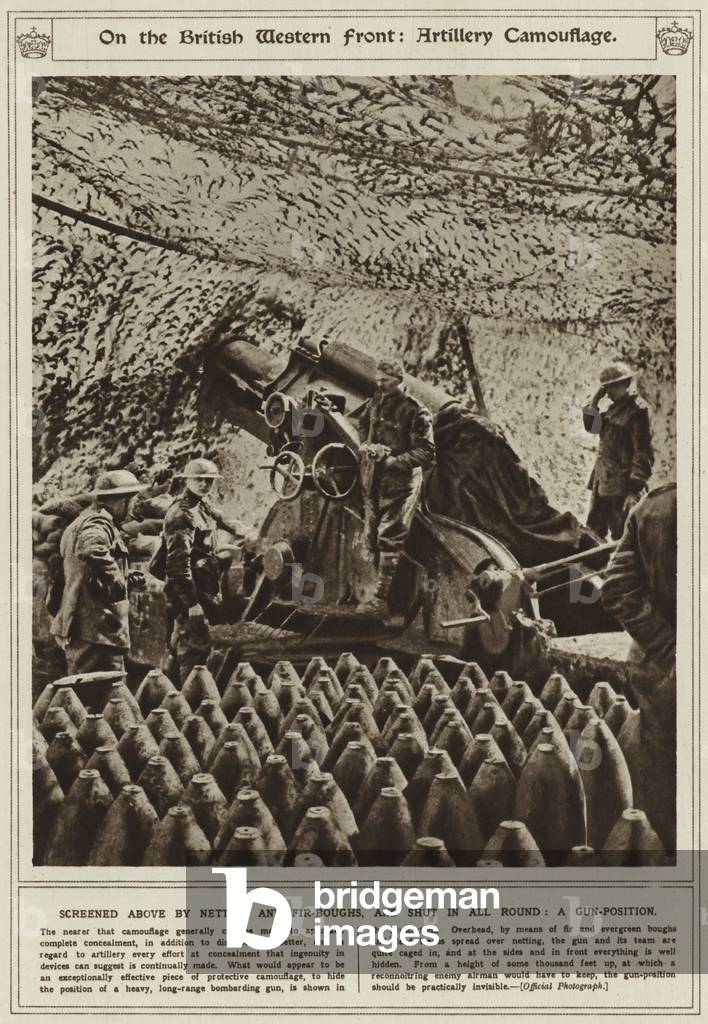 On the British Western Front, artillery camouflage, screened above by netting and fir-boughs, and shut in all round, a gun-position (b/w photo)