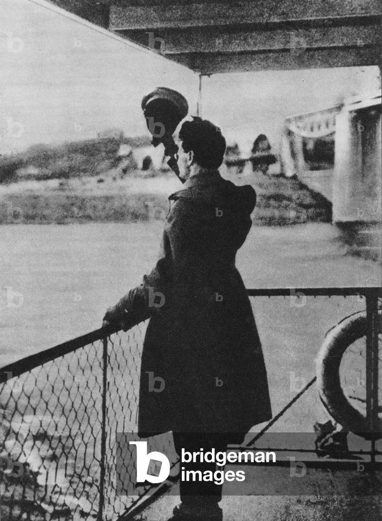 Trotsky going into exile, 1929 (b/w photo)