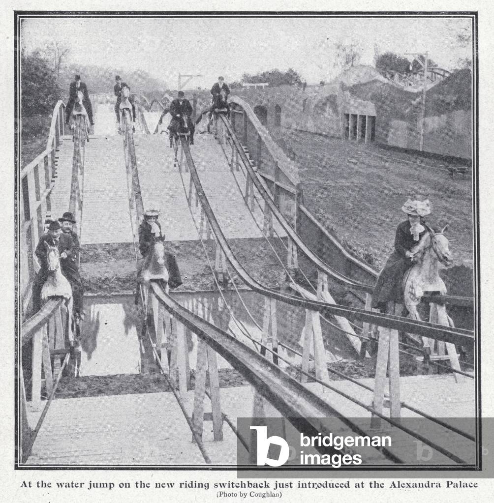 Riders at the water jump on the new riding switchback at the Alexandra Palace, Muswell Hill, London (b/w photo)