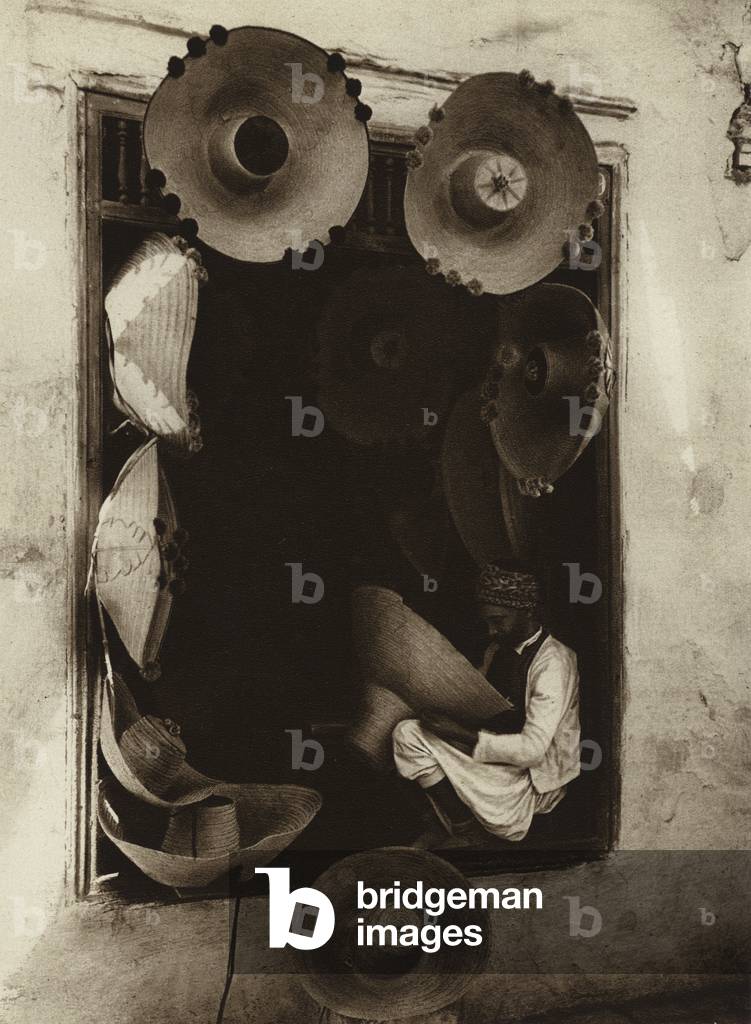 Tunisian hat weaver (b/w photo)