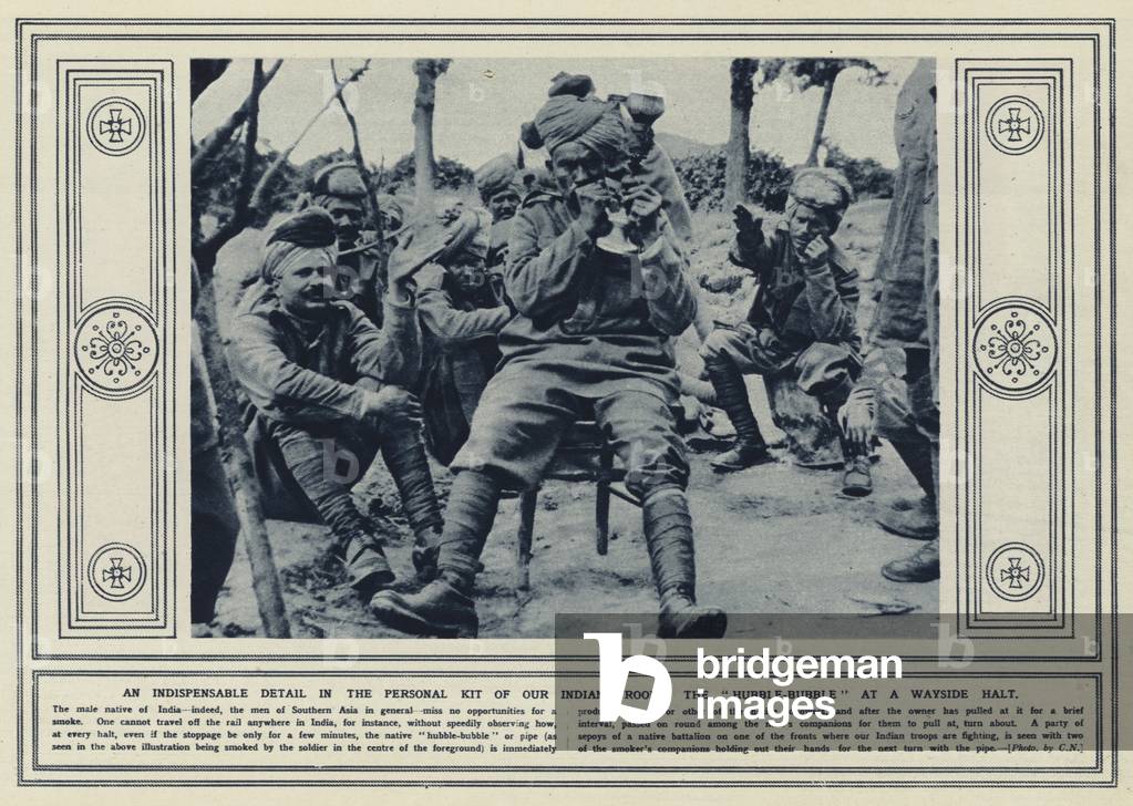 An indispensable detail in the personal kit of our Indian troops, the hubble-bubble at a wayside halt (b/w photo)