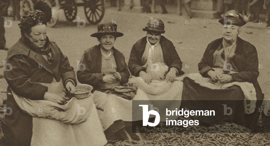 Professional pea shellers (b/w photo)