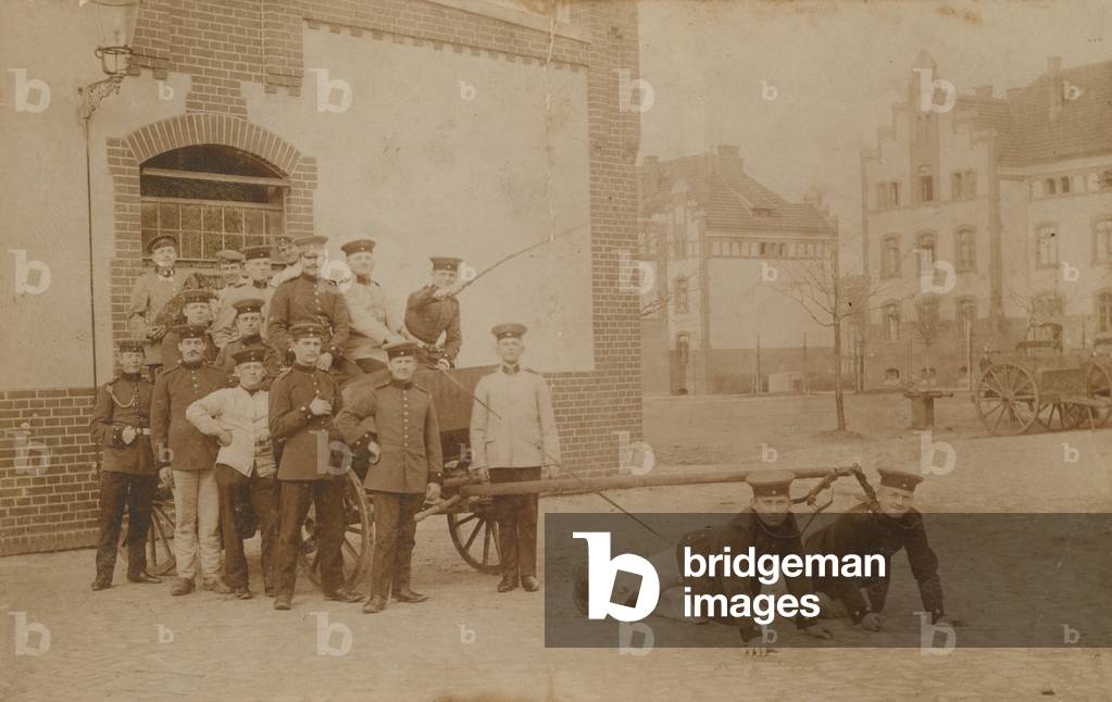 German soldiers pulling (gun?) carriage.  Postcard sent in 1913.