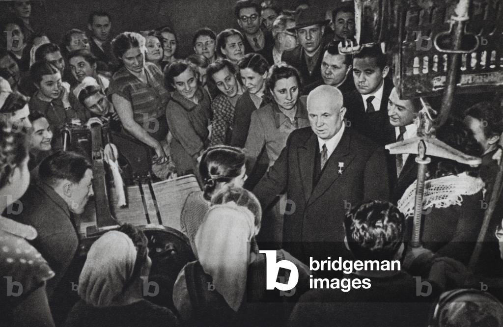 USSR circa 1960: Nikita Khrushchov among textitle workers at Tashkent (b/w photo)