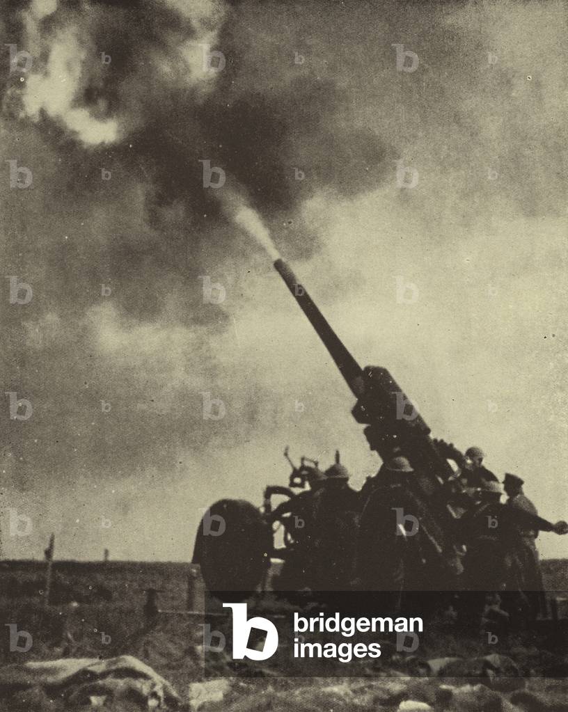 British 3.7 inch anti-aircaft gun in action, World War II, 1939-1945 (b/w photo)