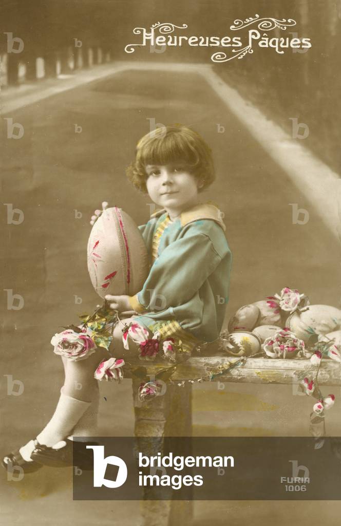 Boy with easter eggs (colour photo)