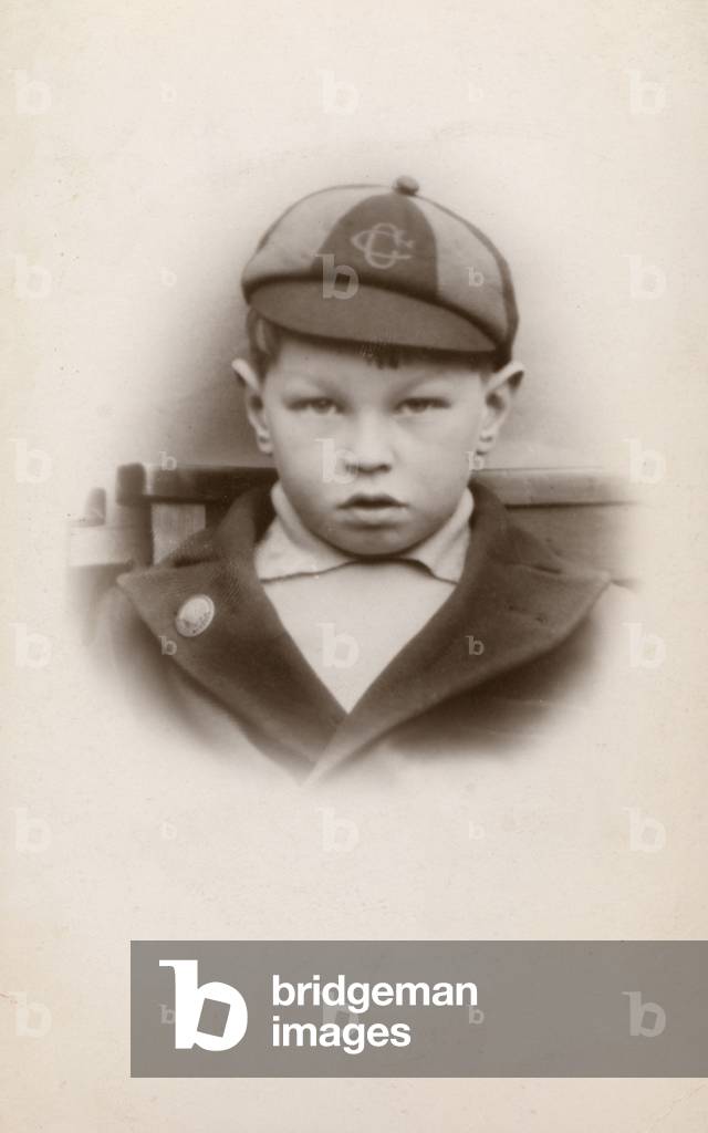 Schoolboy in uniform (b/w photo)