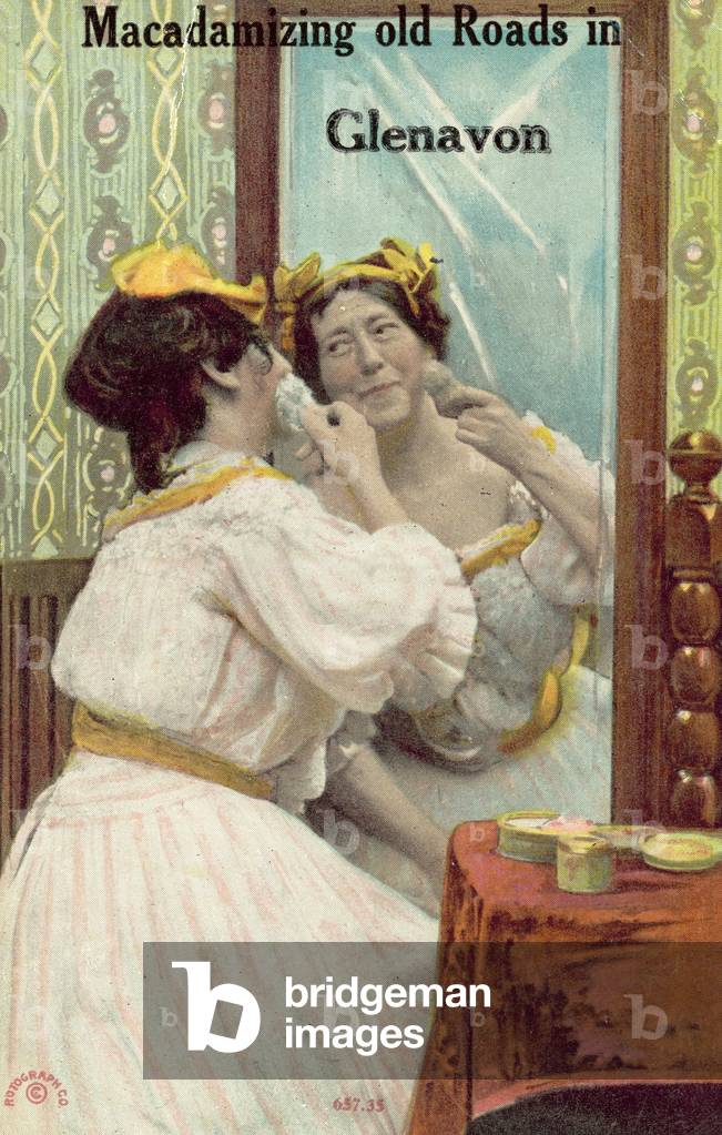 Woman putting on make up (colour photo)