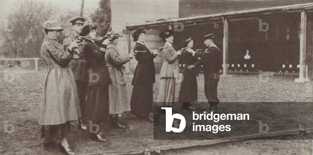 Members of the Women's Royal Naval Reserve (Wrens) taking part in revolver practice, First World War (b/w photo)