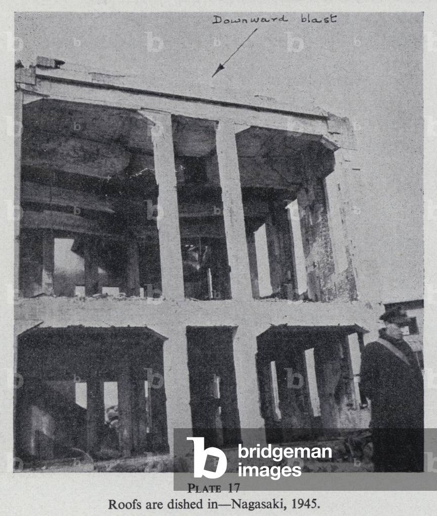 Building damaged by the explosion of the atom bomb dropped on Nagasaki, Japan, World War II, 1945 (b/w photo)