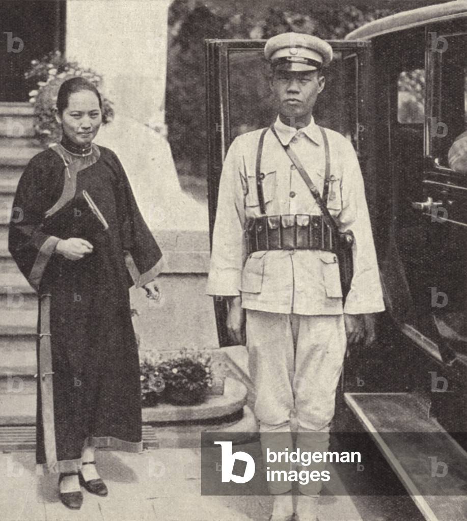Soong Ching-ling, Chinese political figure seen here with her bodyguard (b/w photo)