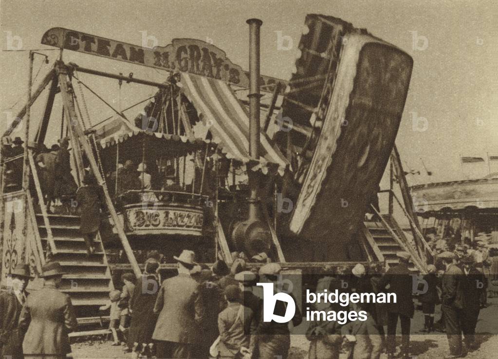 Bank holiday fairground ride on Hampstead Heath (b/w photo)