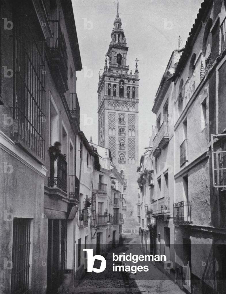 A Street and the Giralda, Seville (b/w photo)