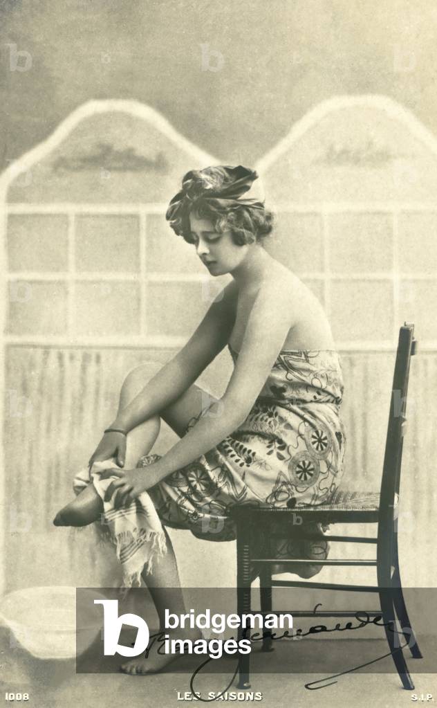 Woman in a bath towel (b/w photo)