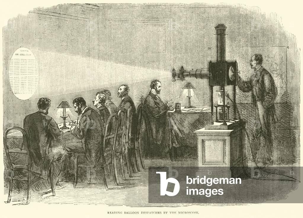 Reading balloon despatches by the microscope, October 1870 (engraving)