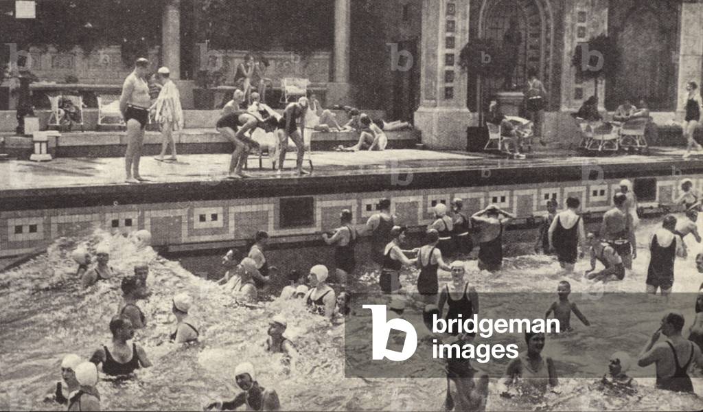 People in the open air swimming pool at the Gellert Baths, Budapest (b/w photo)