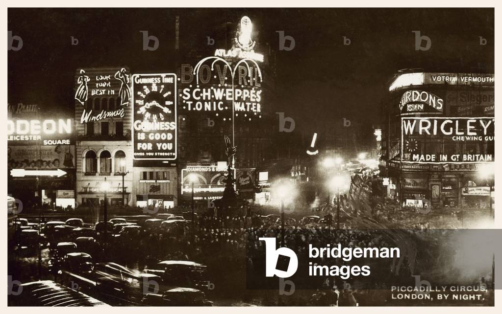 Piccadilly Circus, London, at night (b/w photo)