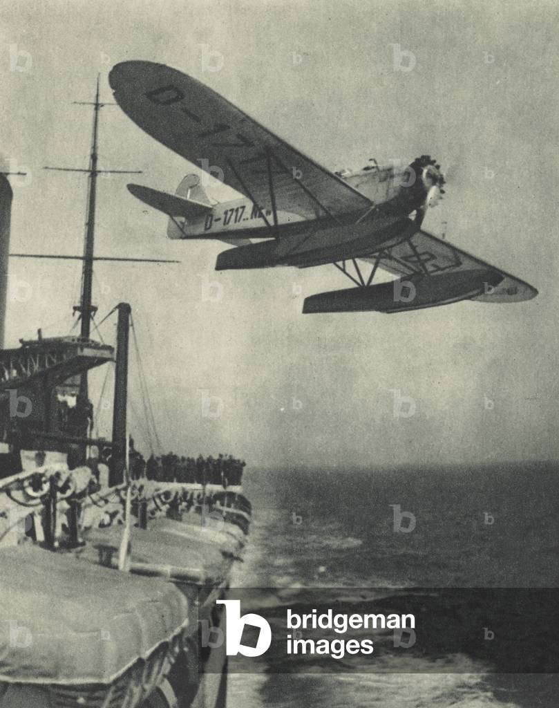 Mail plane being catapulted from the deck of a liner (b/w photo)