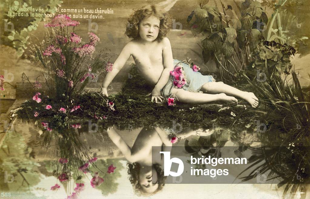 Child, with reflection in pool (colour photo)