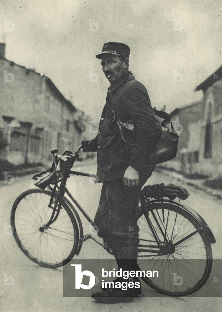 This French postman finds his bicycle very useful (b/w photo)