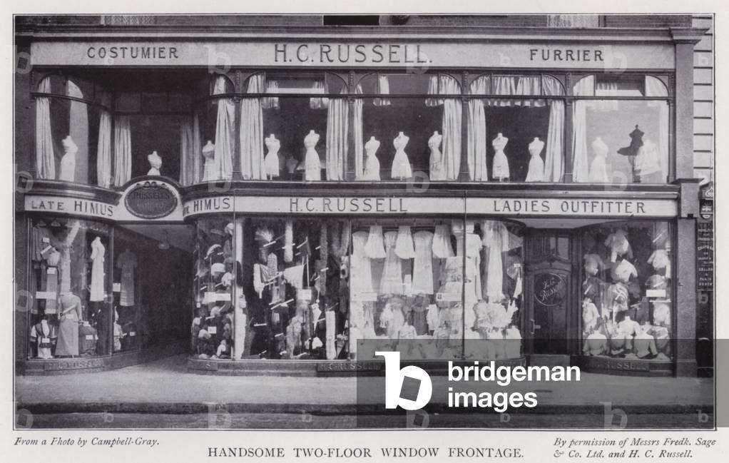 Handsome two-floor window frontage (b/w photo)