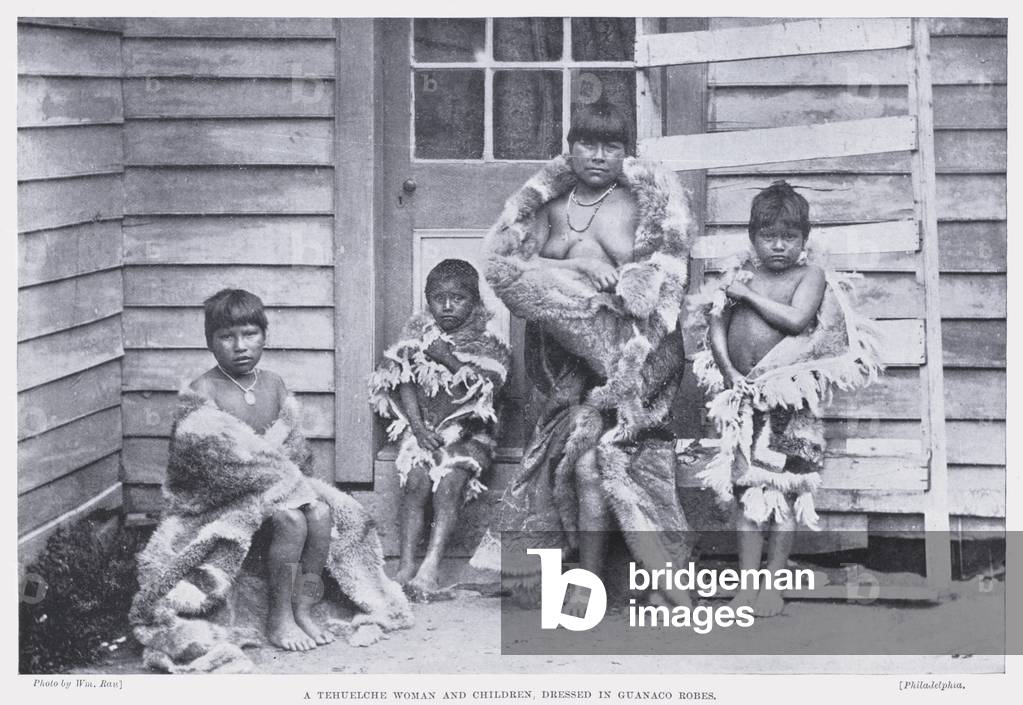 A Tehuelche Woman and Children, dressed in Guanaco Robes (b/w photo)
