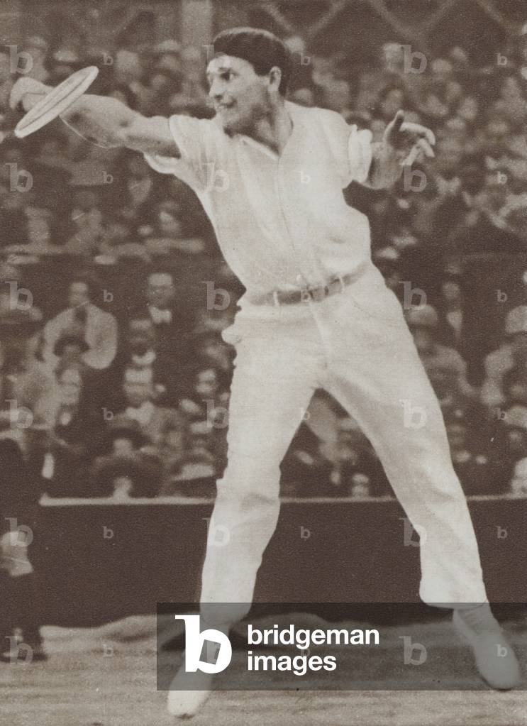 French tennis player Jean Borotra playing at Wimbledon, 1926 (b/w photo)