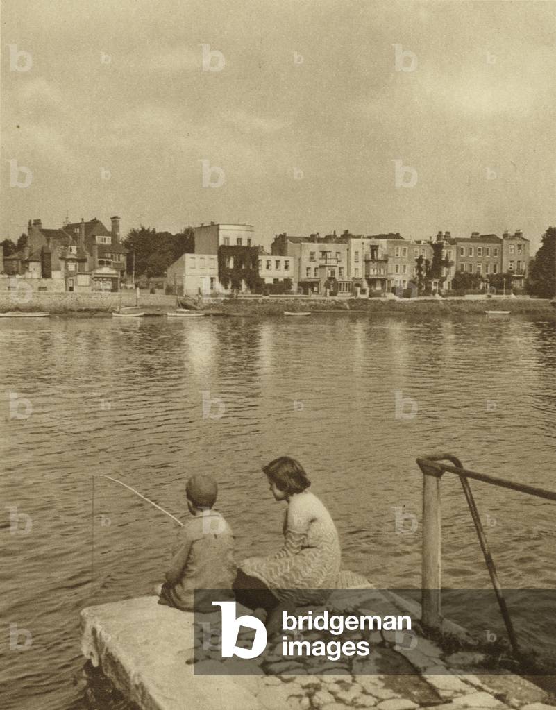 Old Middlesex village of Strand-on-the-Green seen from Surrey (b/w photo)