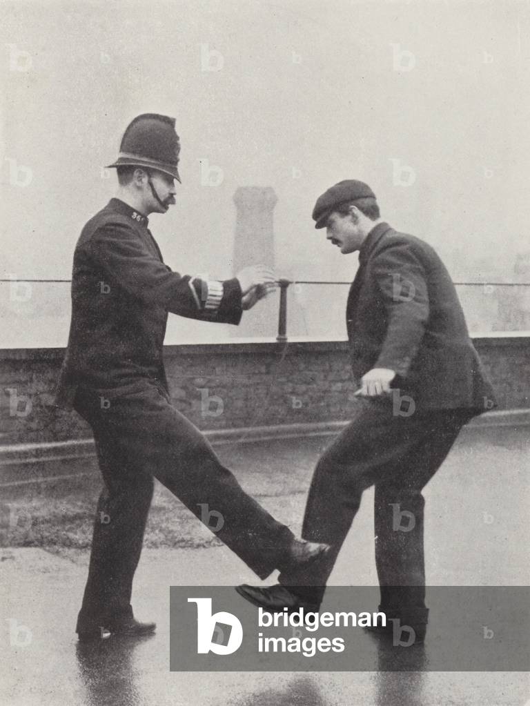 Self-Defence, A Kicking Prisoner (b/w photo)