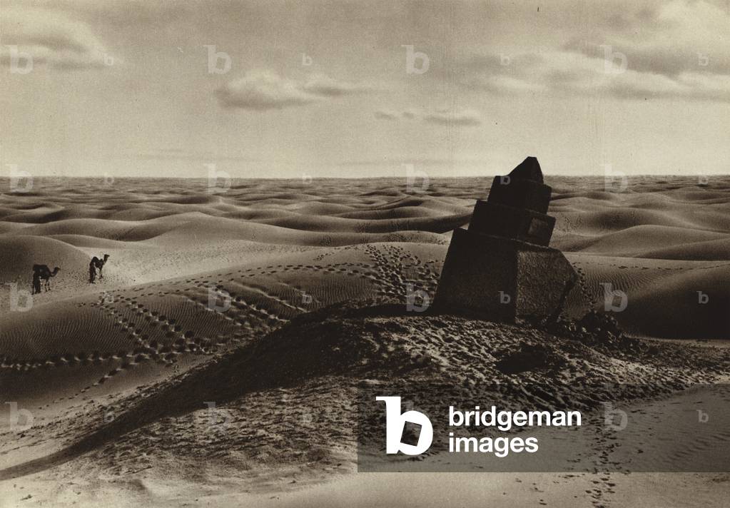 A mile-stone in the desert (b/w photo)