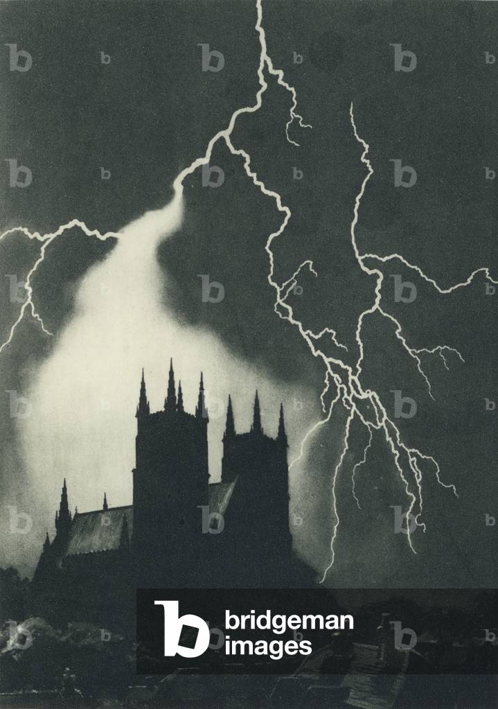 Forked lightning in the sky above a cathedral (colour litho)