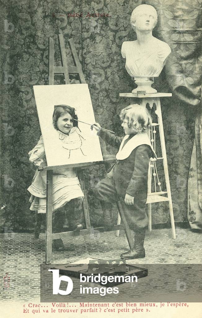 Children painting, girl with head through canvas (b/w photo)