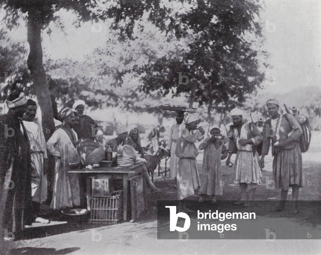 Egypt: Luncheon in the Streets of Cairo (b/w photo)