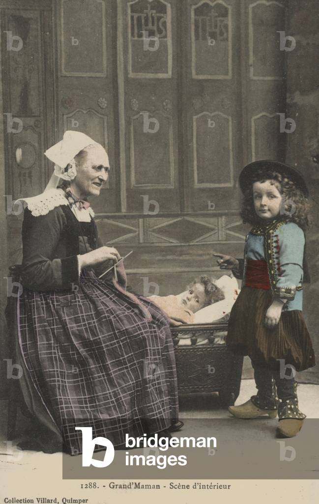 Children with their grandmother (colour photo)