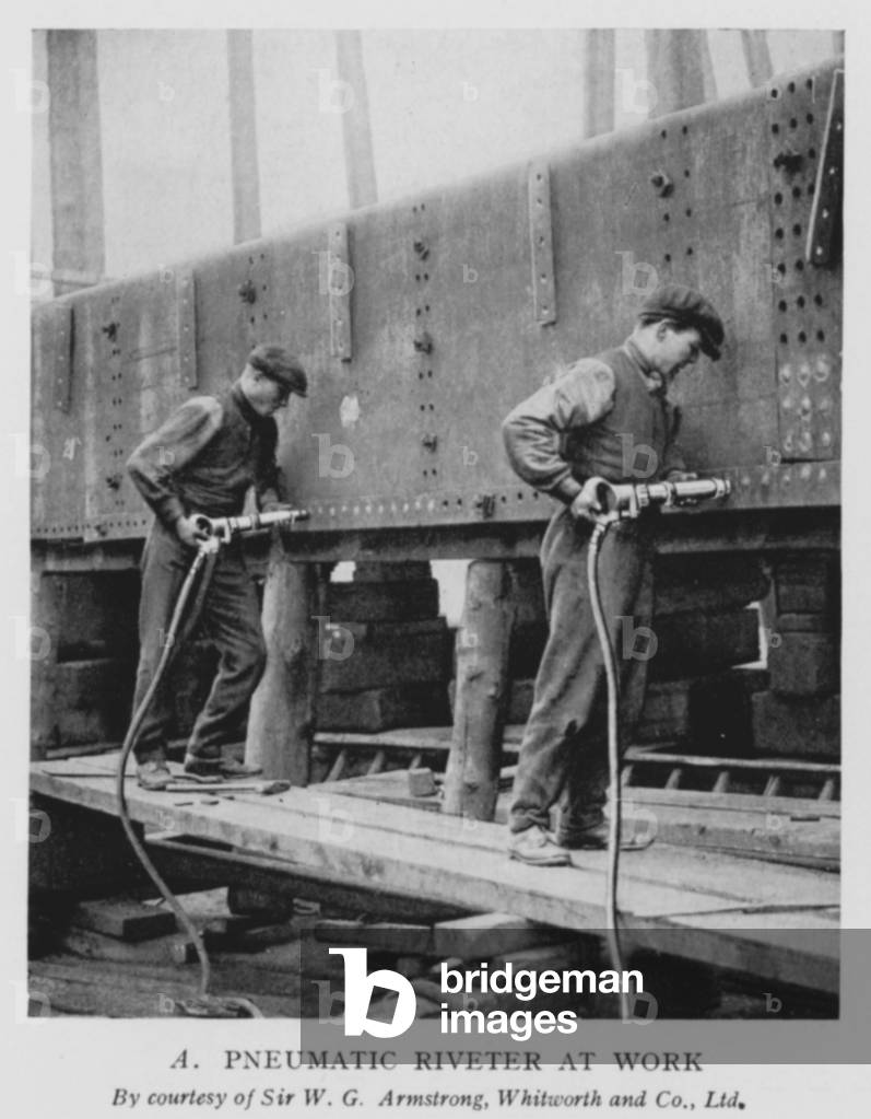 Pneumatic riveter at work (b/w photo)
