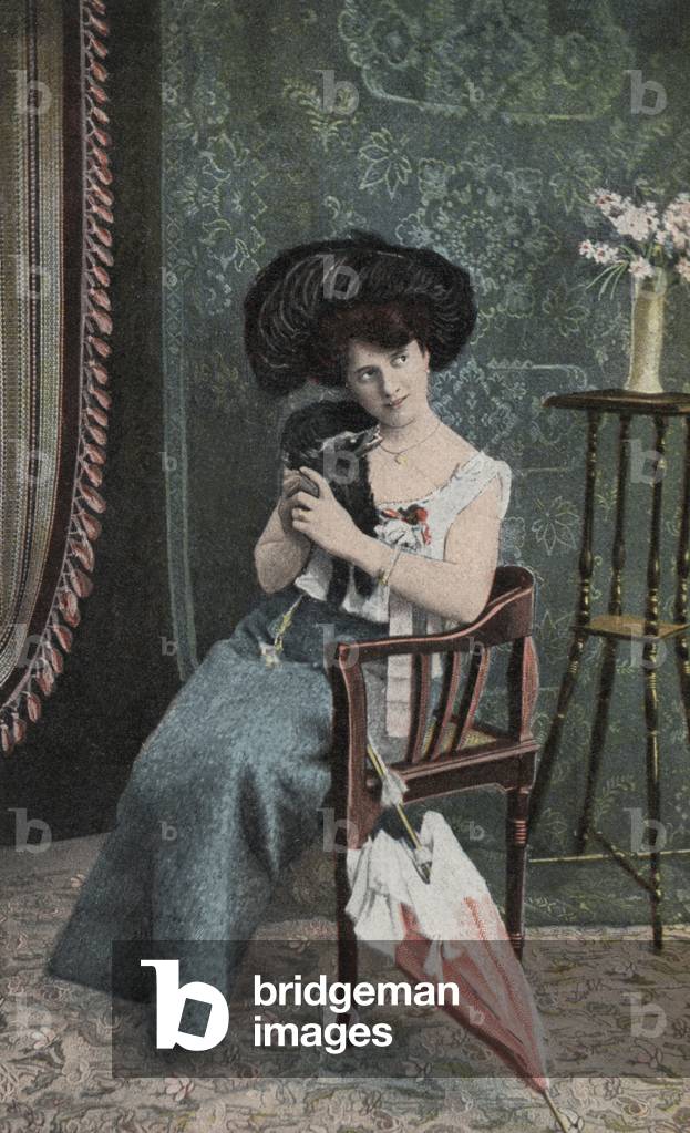 Woman in a feathered hat (colour photo)