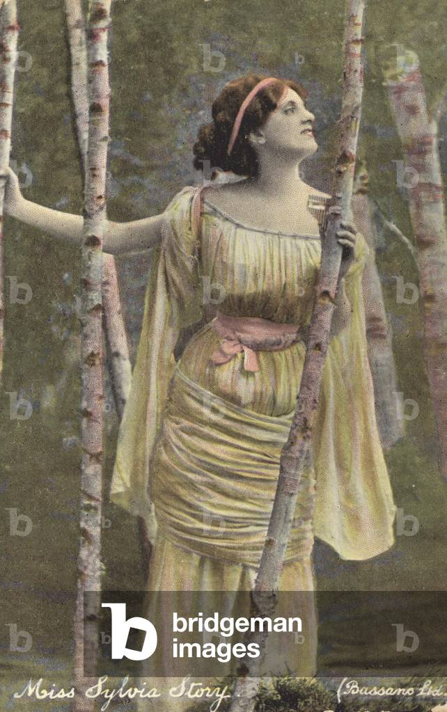 Girl in a birch wood (colour photo)