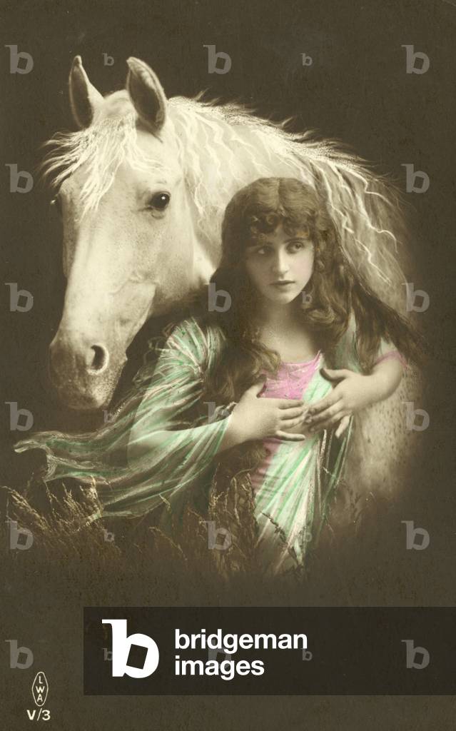 Girl with a horse (colour photo)