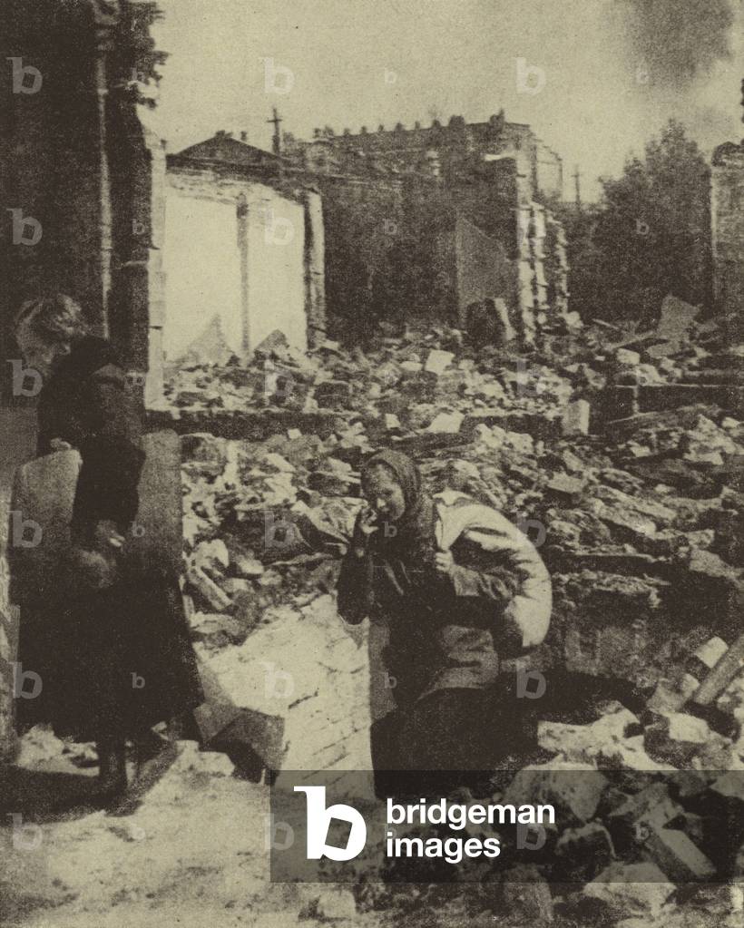 Russian women emerging from their shelter after Red Army lifted the siege of Stalingrad, World War II, November 1942 (b/w photo)