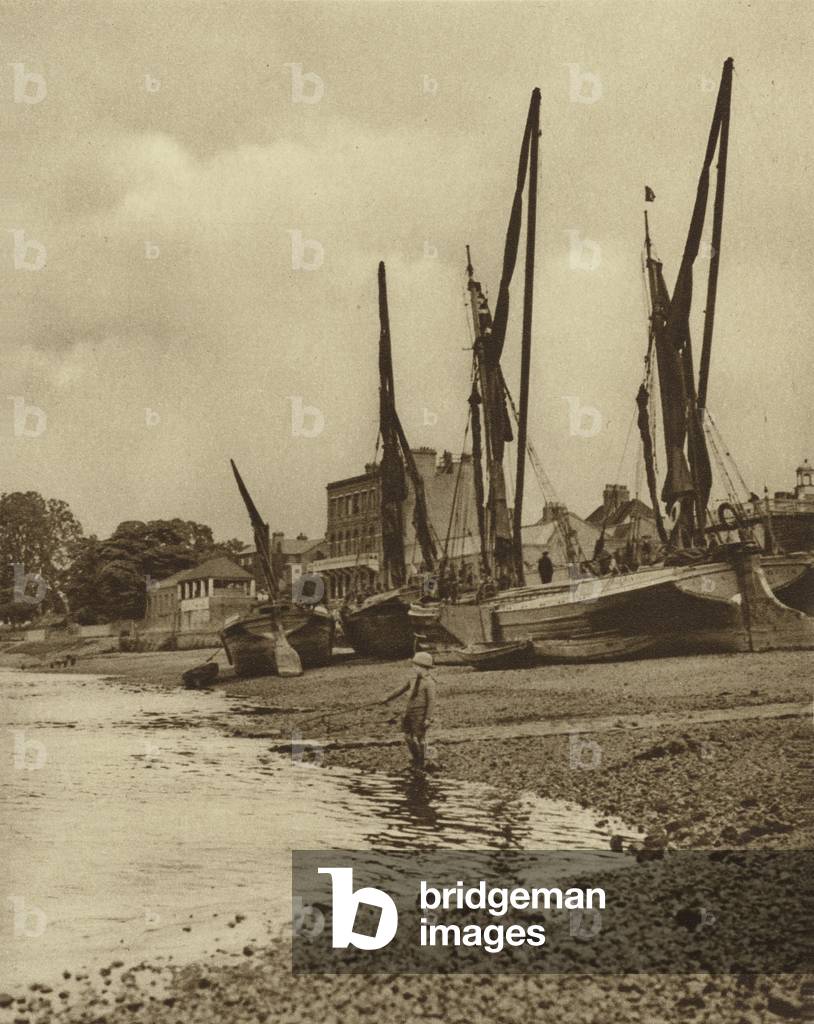 Barges aground at Mortlake with the tide at full ebb (b/w photo)