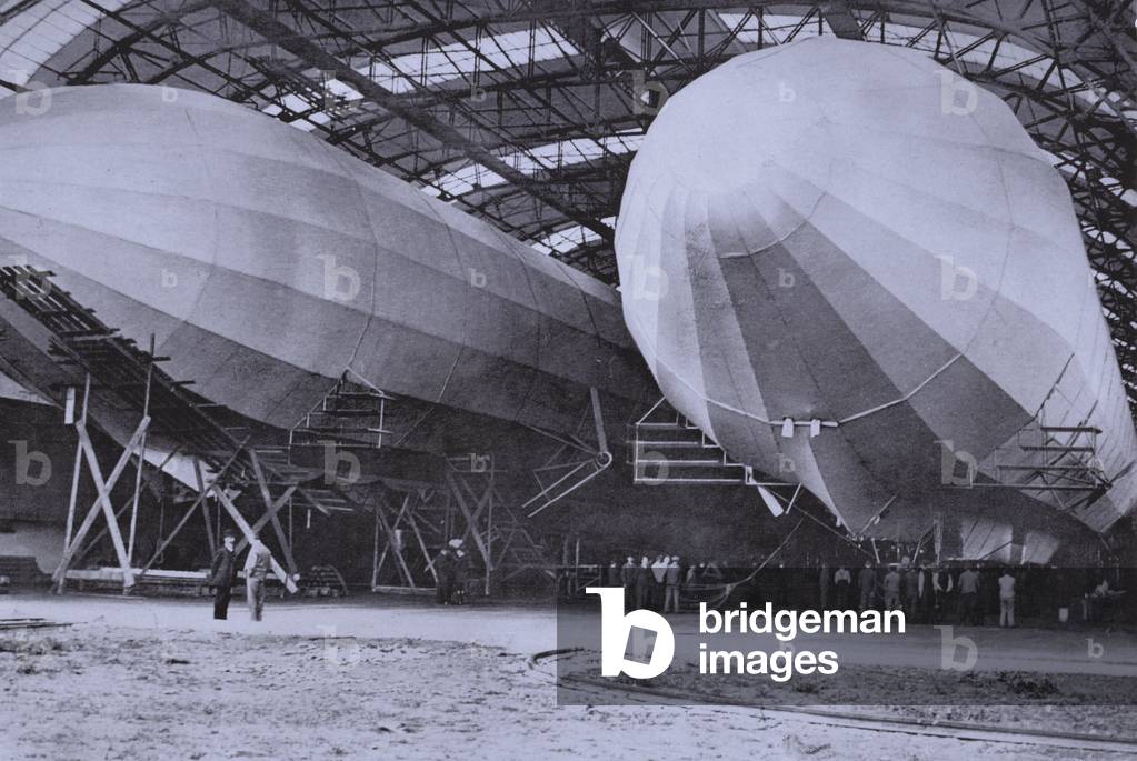 German Zeppelin airships in their giant storage shed (b/w photo)
