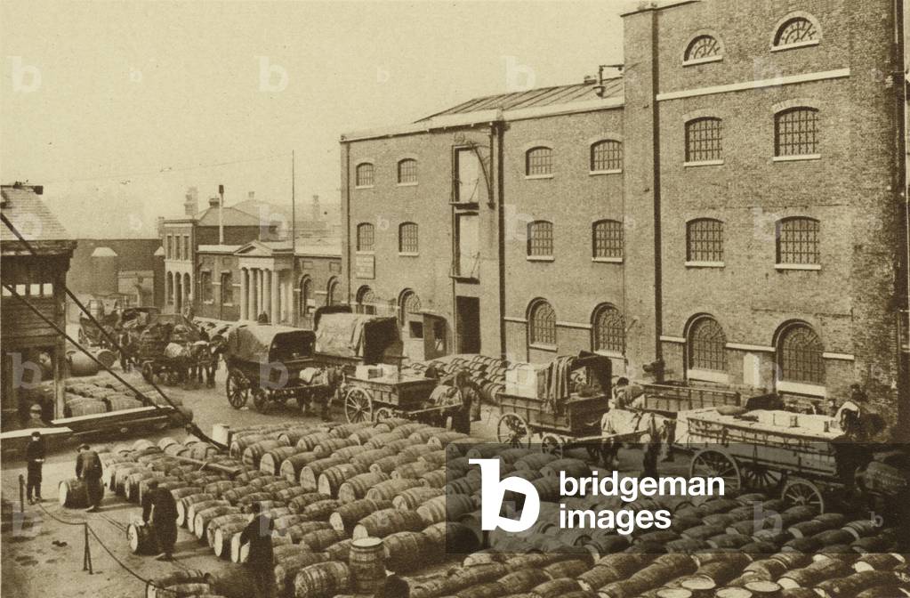 Barrels of molasses at West India Docks (b/w photo)